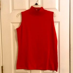 Turtleneck no sleeve sweater top.